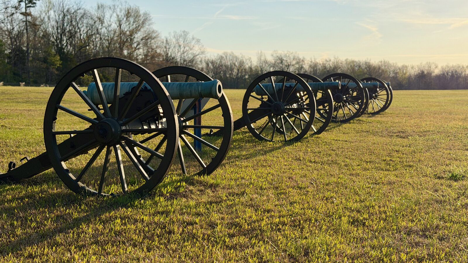 Field guns at sunrise in Sarah Bell's cotton field, Shiloh National Military Park.
